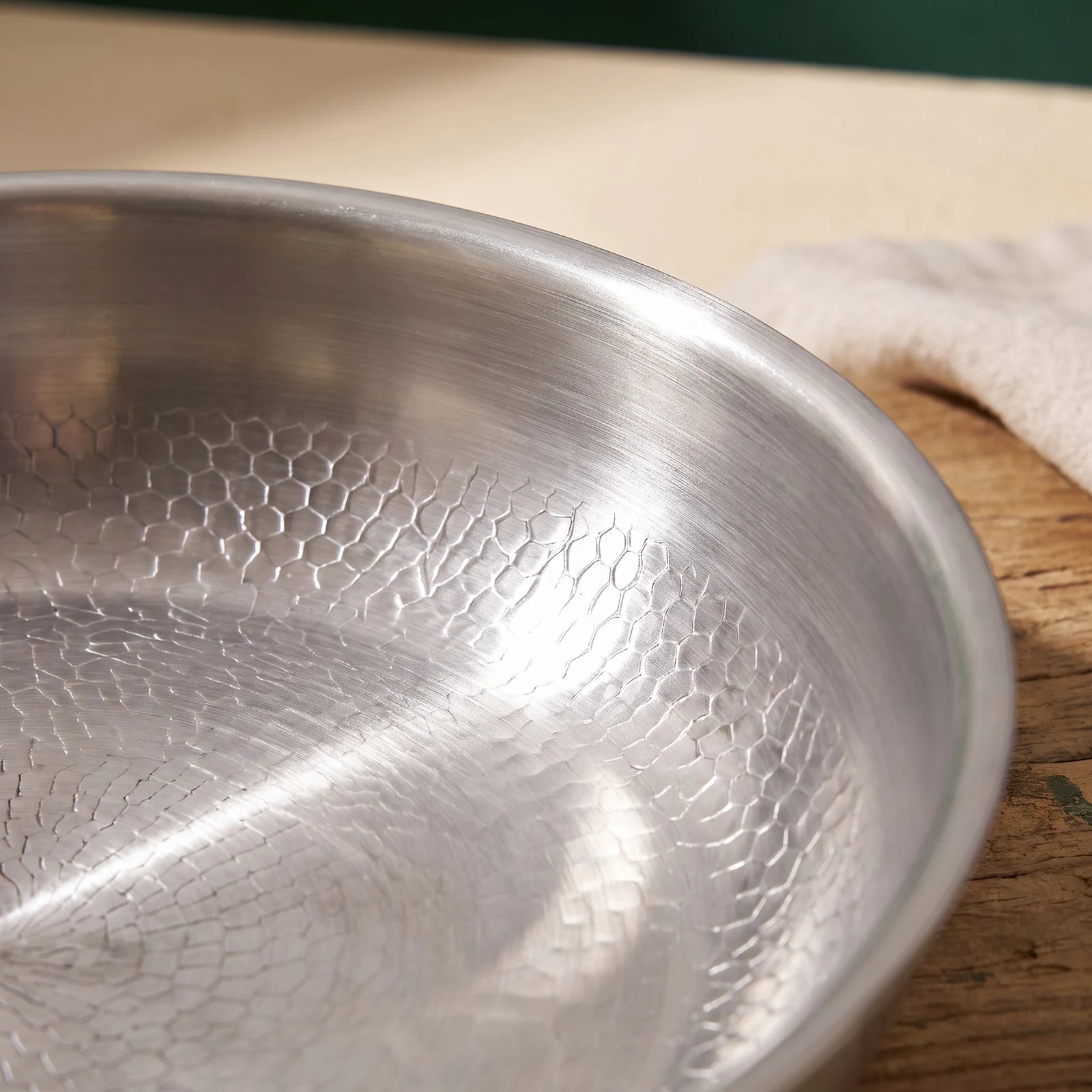 Close-up of the textured titanium cooking surface
